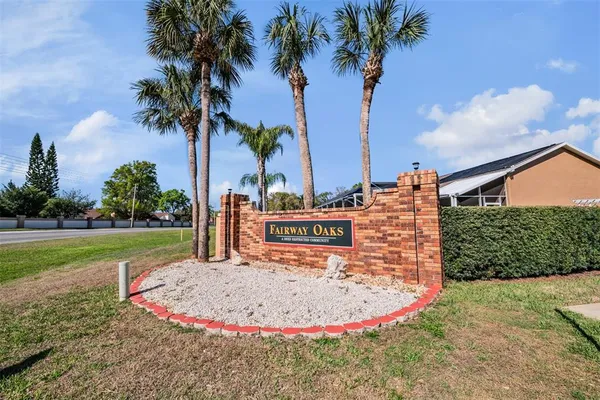 a view of a kitchen with furniture and a window