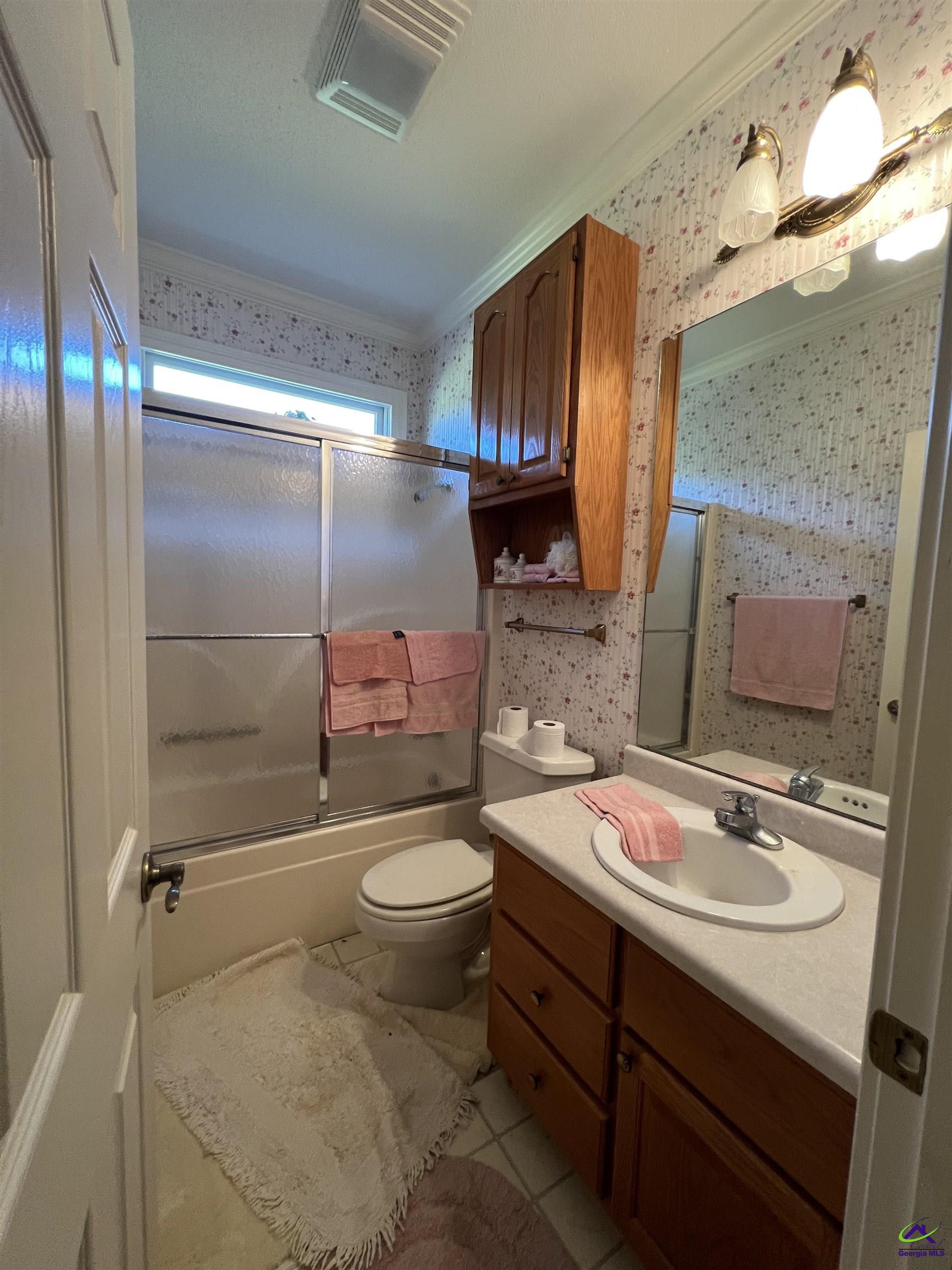 762 Nicholson-Carr Road Chester, GA 31012 - Photo 20 of 81 a bathroom with a sink toilet and shower