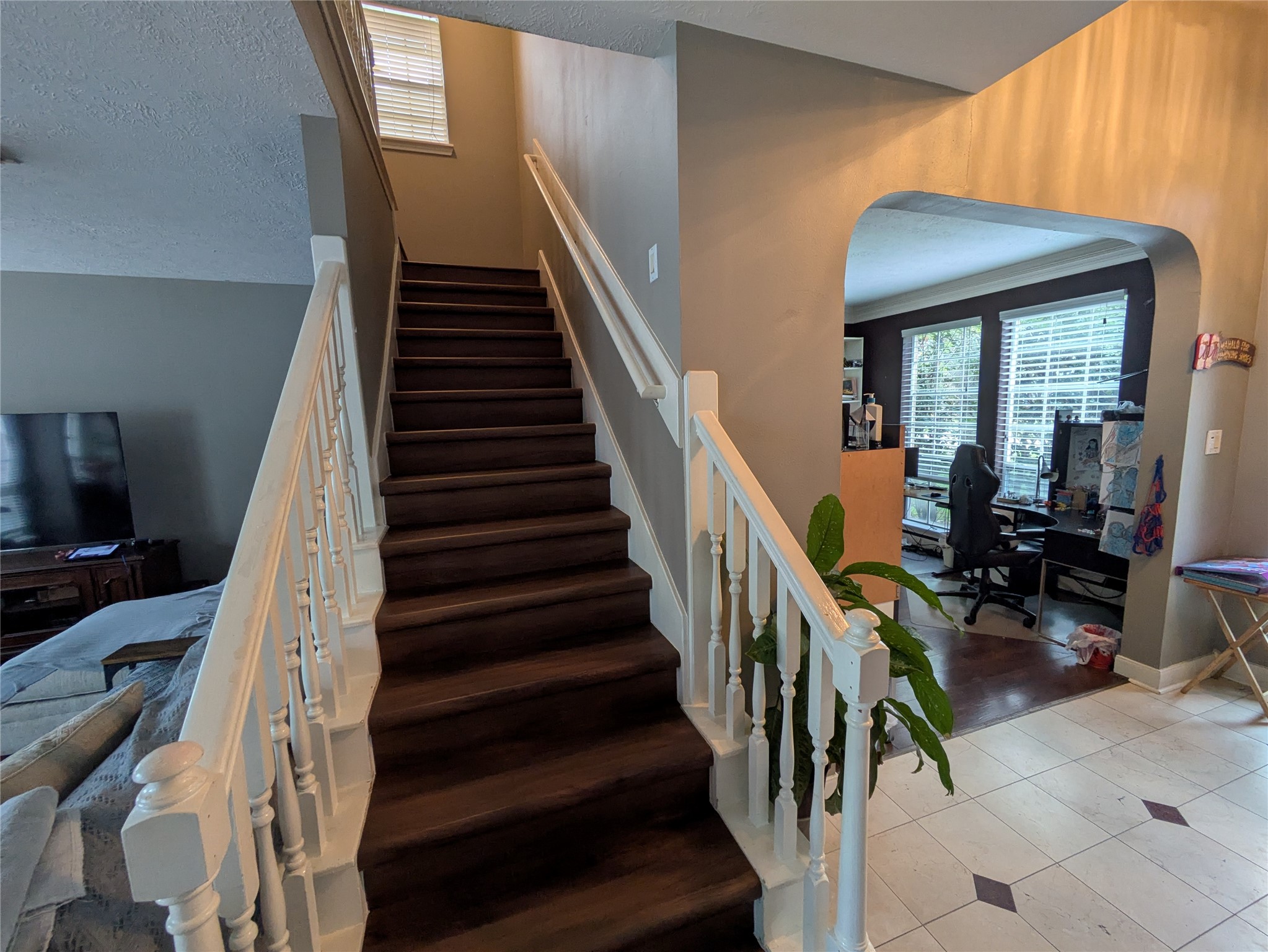 9222 Symphonic Lane Houston, TX 77040 - Photo 7 of 33 LVP Staircase to 2nd floor