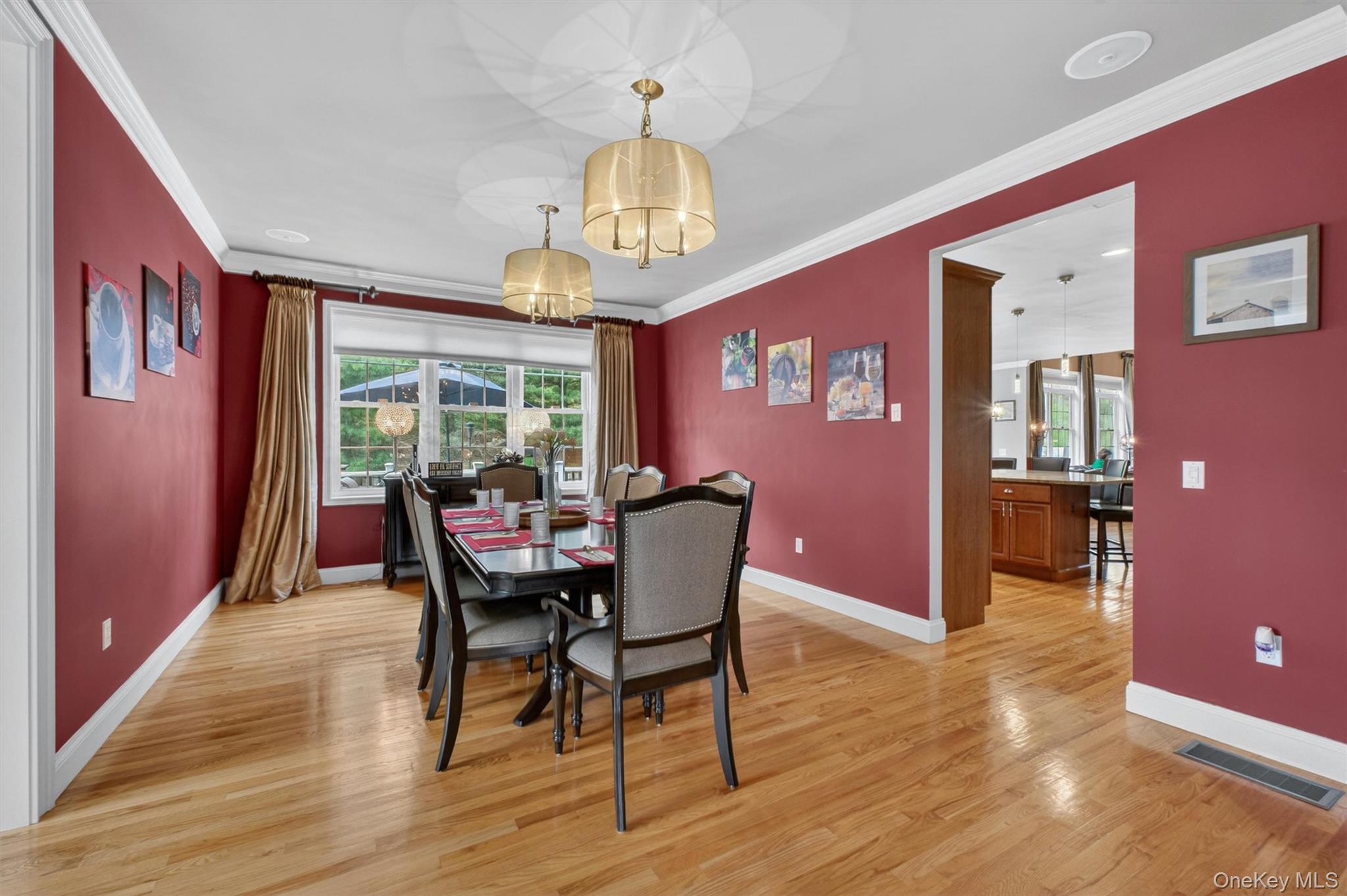 219 Country Club Road Hopewell Junction, NY 12533 - Photo 18 of 49 a dining room with furniture a chandelier and wooden floor