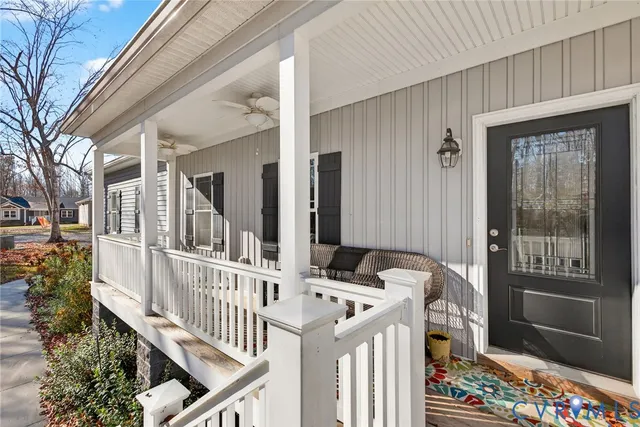 a view of balcony with wooden floor