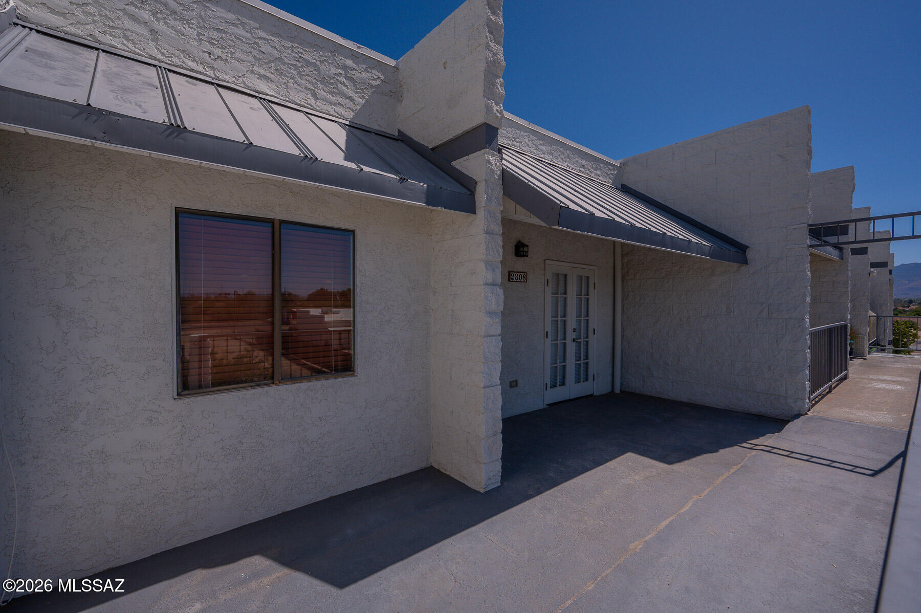 7777 East Golf Links Road, Unit 2308 Tucson, AZ 85730 - Photo 11 of 37 a view of a car garage door