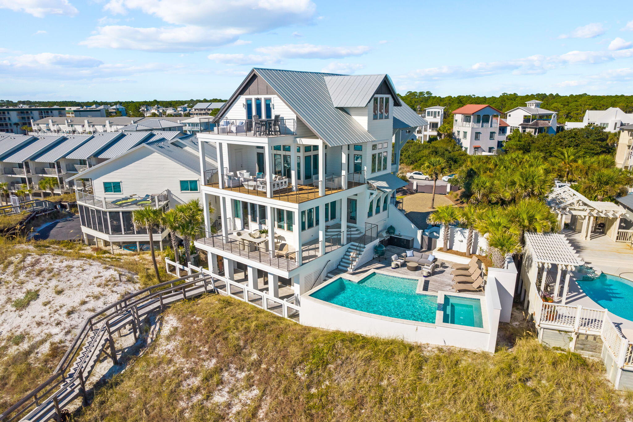 376 Beachfront Trail Santa Rosa Beach, FL 32459 - Photo 1 of 62 aerial view of a house with a big yard and large trees
