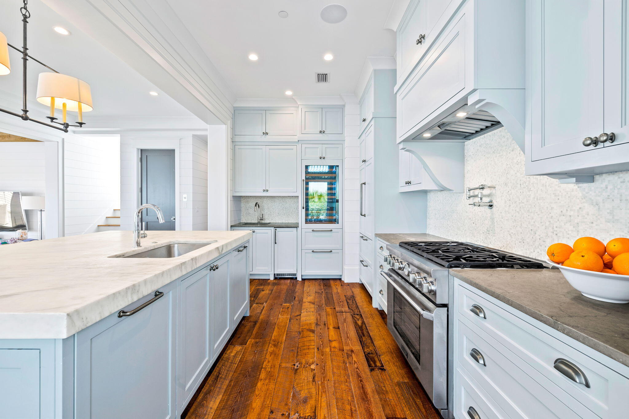 376 Beachfront Trail Santa Rosa Beach, FL 32459 - Photo 12 of 62 a large kitchen with stainless steel appliances granite countertop a lot of counter space and wooden floors