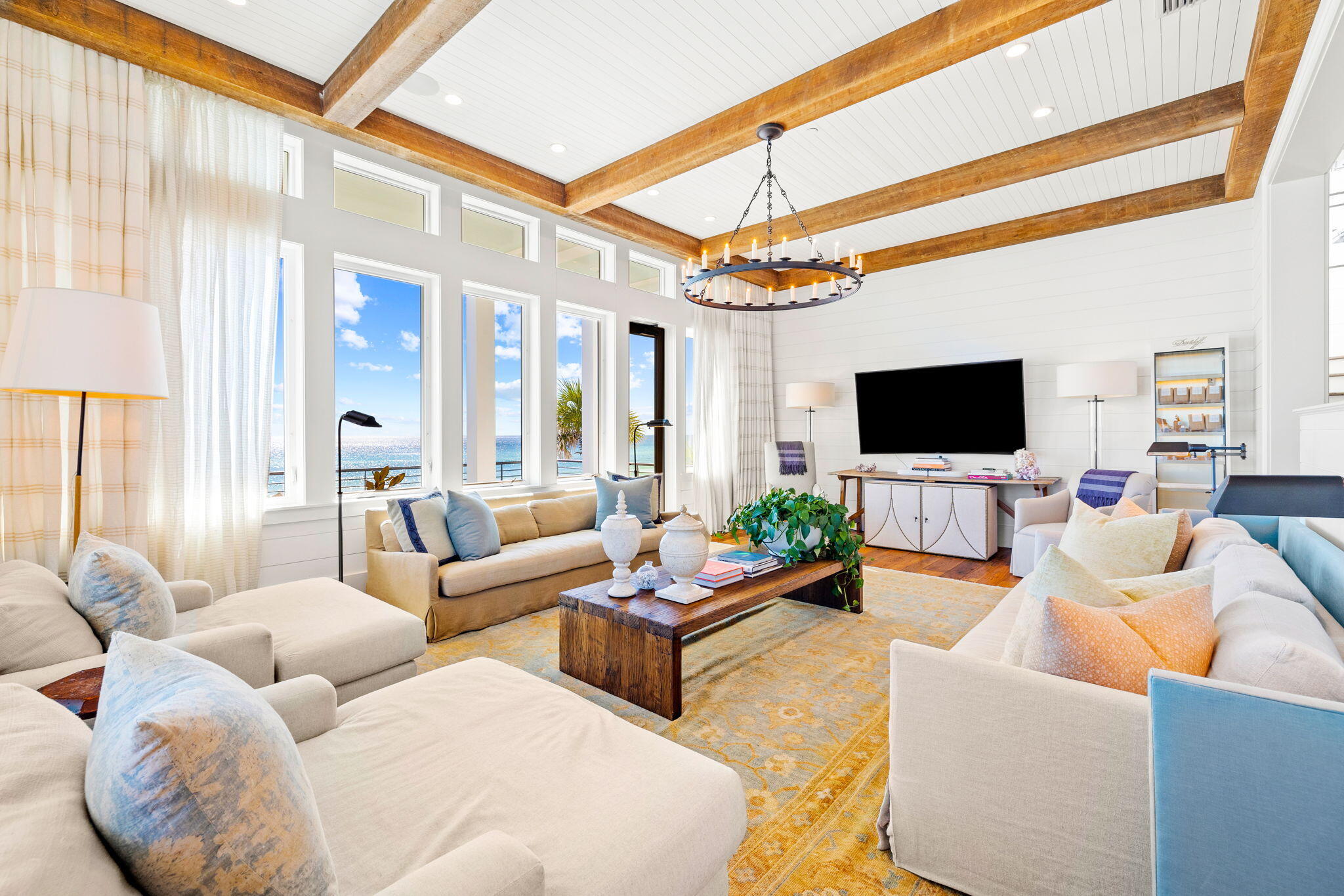 376 Beachfront Trail Santa Rosa Beach, FL 32459 - Photo 18 of 62 a living room with furniture and a flat screen tv