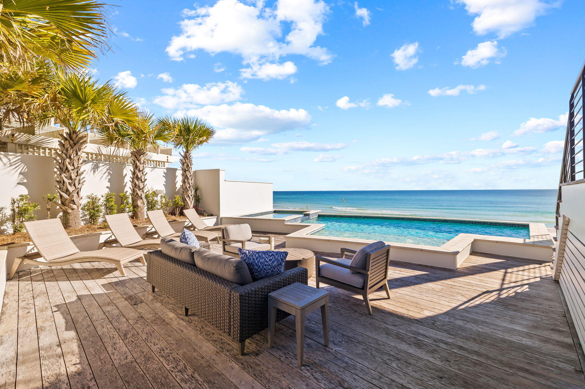 376 Beachfront Trail Santa Rosa Beach, FL 32459 - Photo 26 of 62 a roof deck with outdoor seating and city view