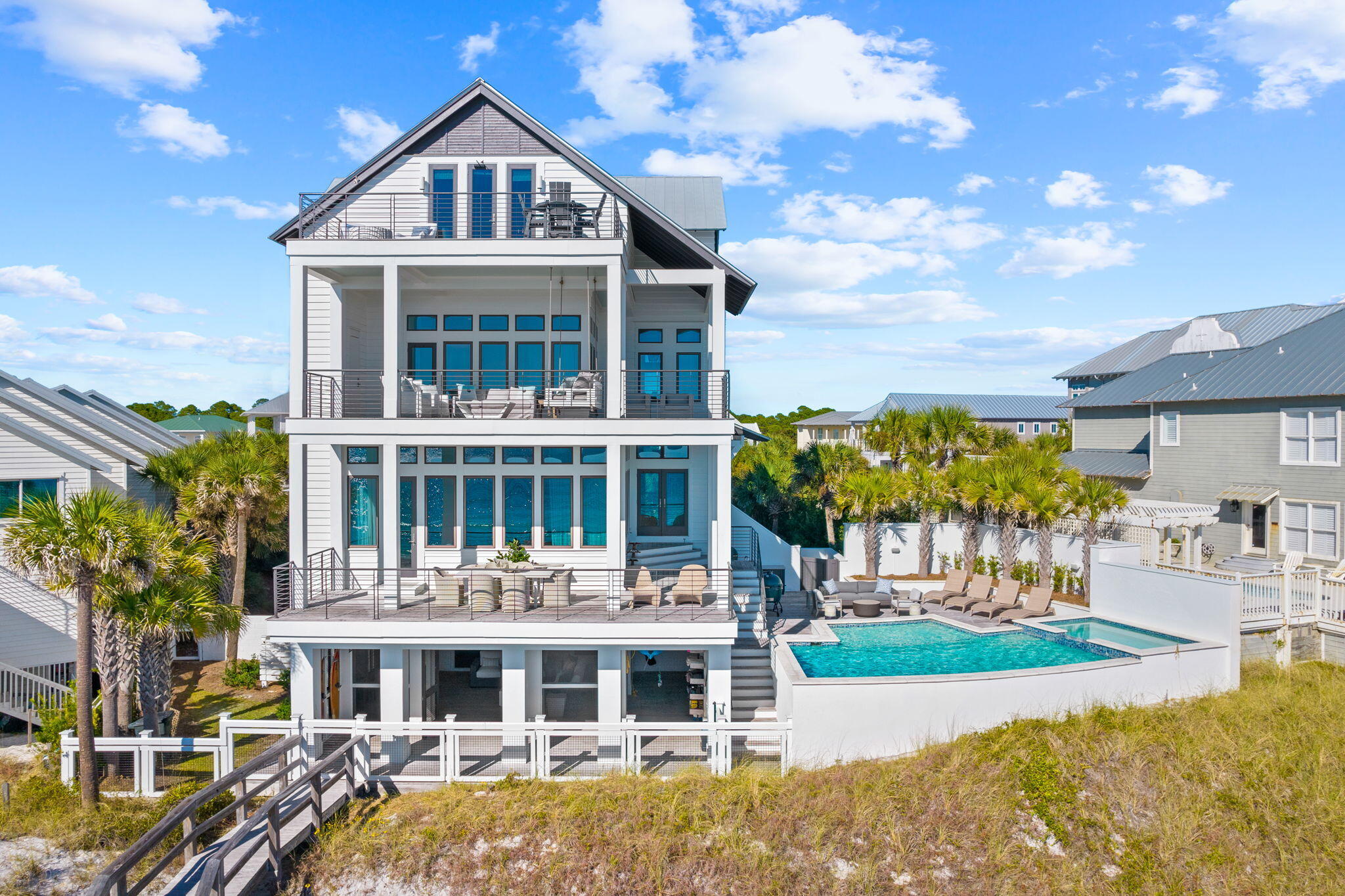 376 Beachfront Trail Santa Rosa Beach, FL 32459 - Photo 28 of 62 a front view of a house with a yard