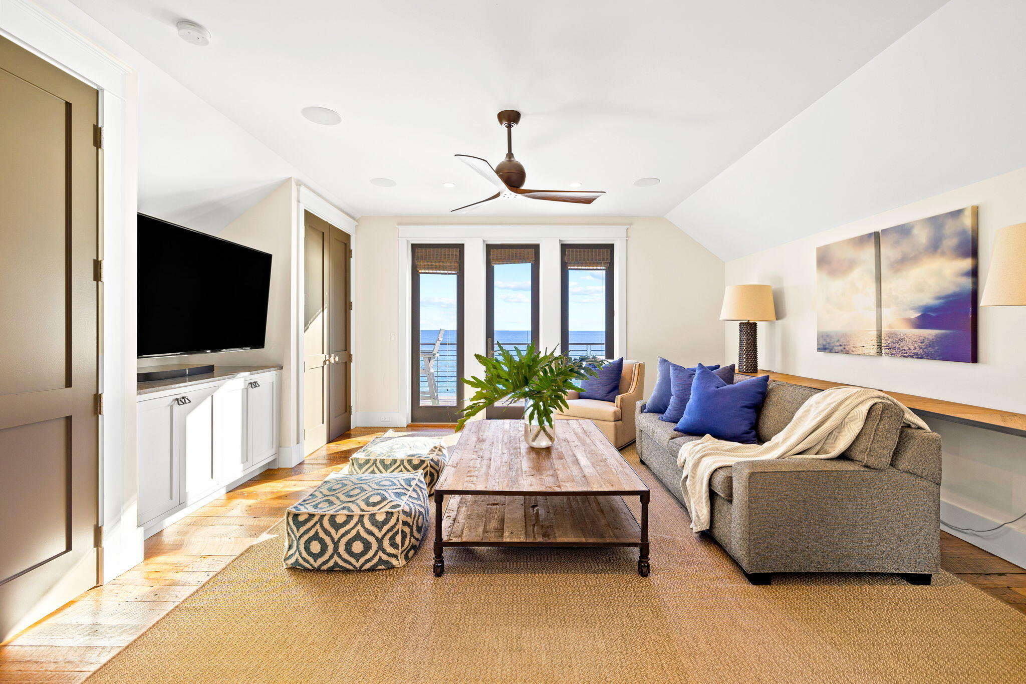 376 Beachfront Trail Santa Rosa Beach, FL 32459 - Photo 42 of 62 a living room with furniture fireplace and flat screen tv