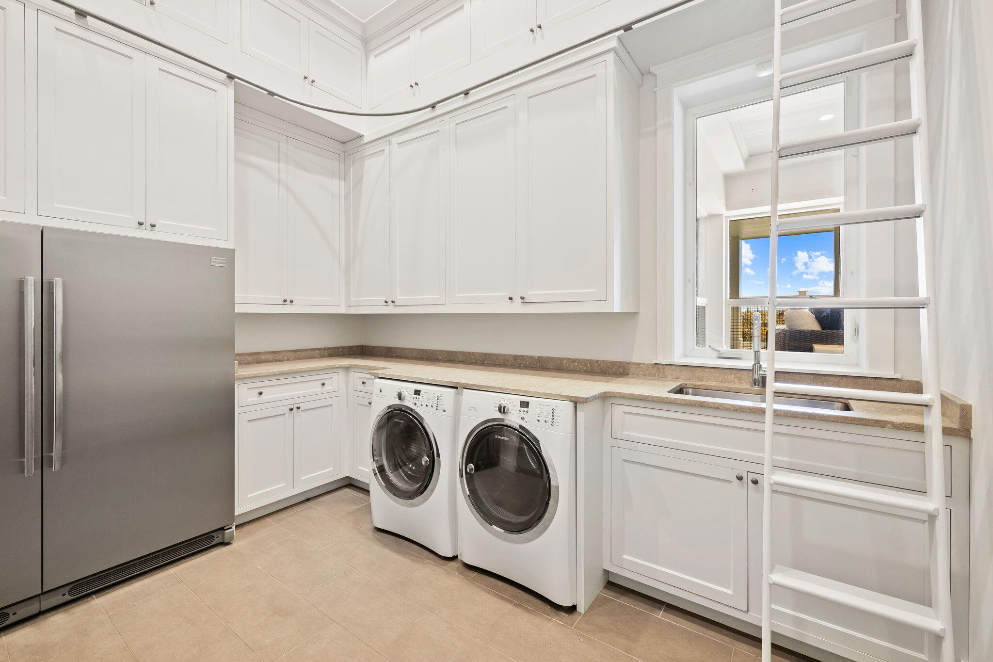 376 Beachfront Trail Santa Rosa Beach, FL 32459 - Photo 48 of 62 a utility room with dryer and washer