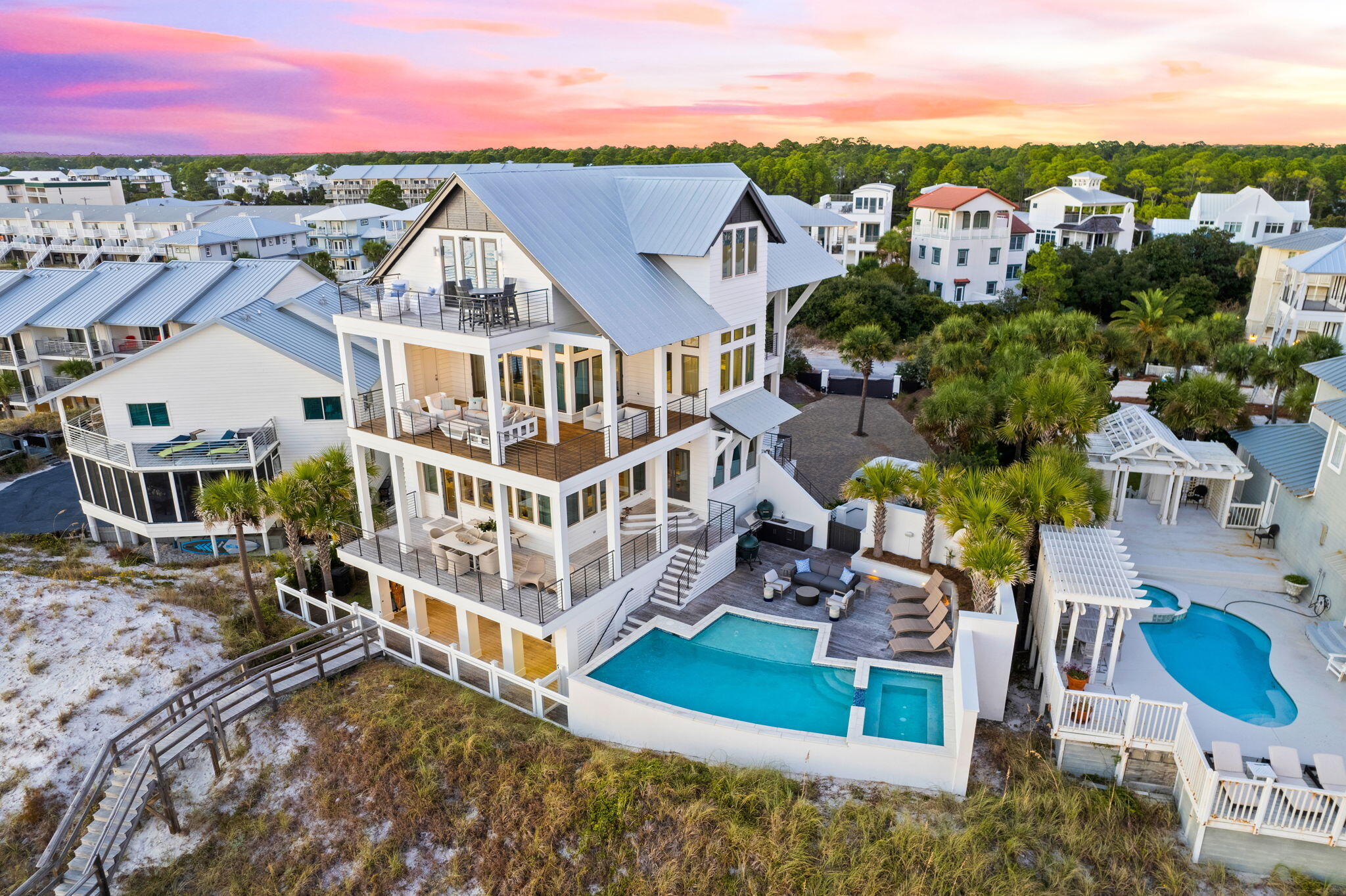 376 Beachfront Trail Santa Rosa Beach, FL 32459 - Photo 58 of 62 an aerial view of a house with a garden