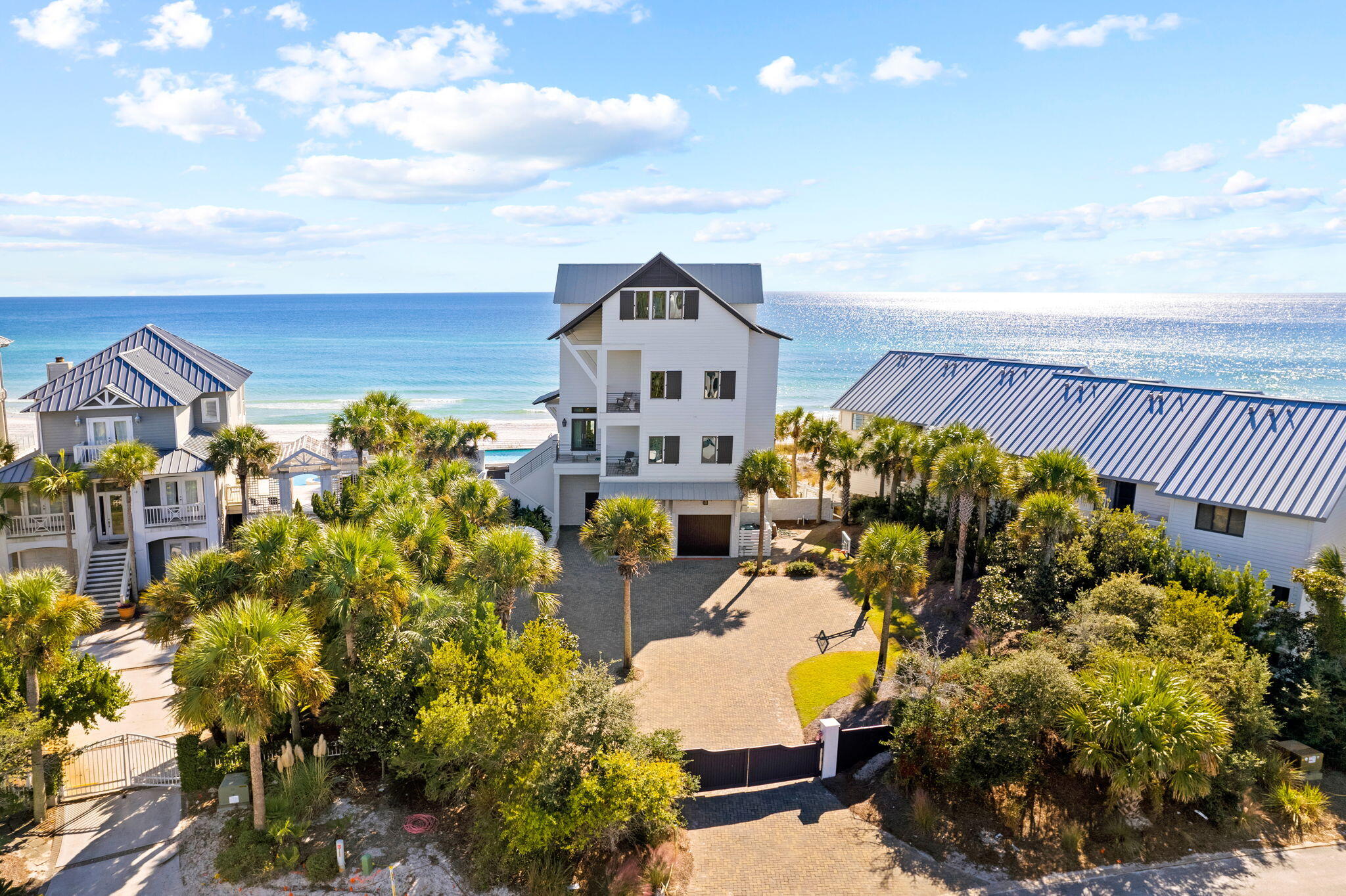 376 Beachfront Trail Santa Rosa Beach, FL 32459 - Photo 59 of 62 an aerial view of a house with a swimming pool outdoor seating and yard