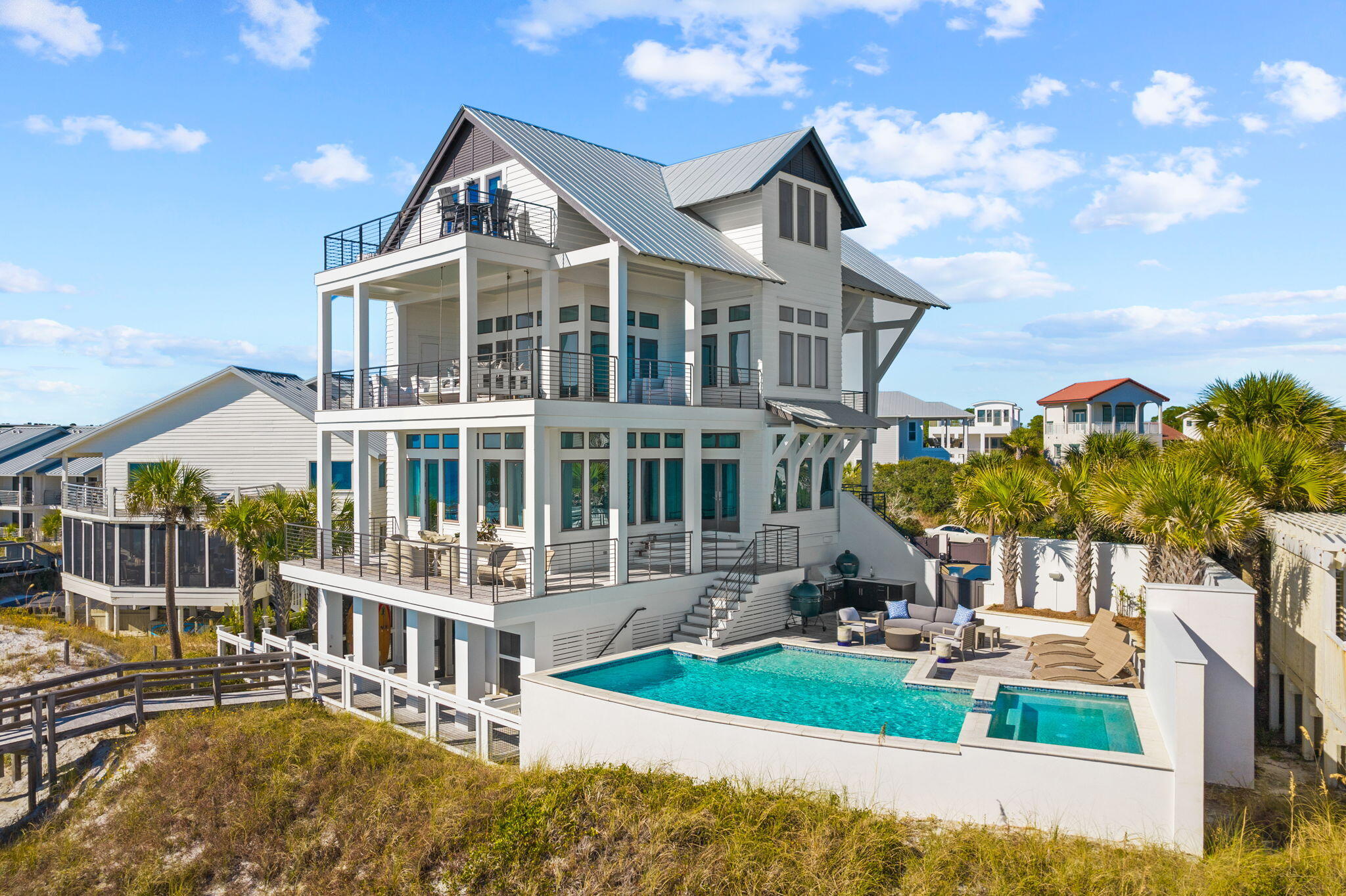 376 Beachfront Trail Santa Rosa Beach, FL 32459 - Photo 6 of 62 a front view of a house with a yard