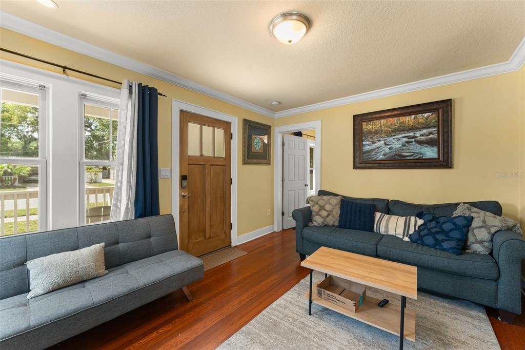 2223 Amherst Avenue Orlando, FL 32804 - Photo 35 of 64 a living room with furniture and a window