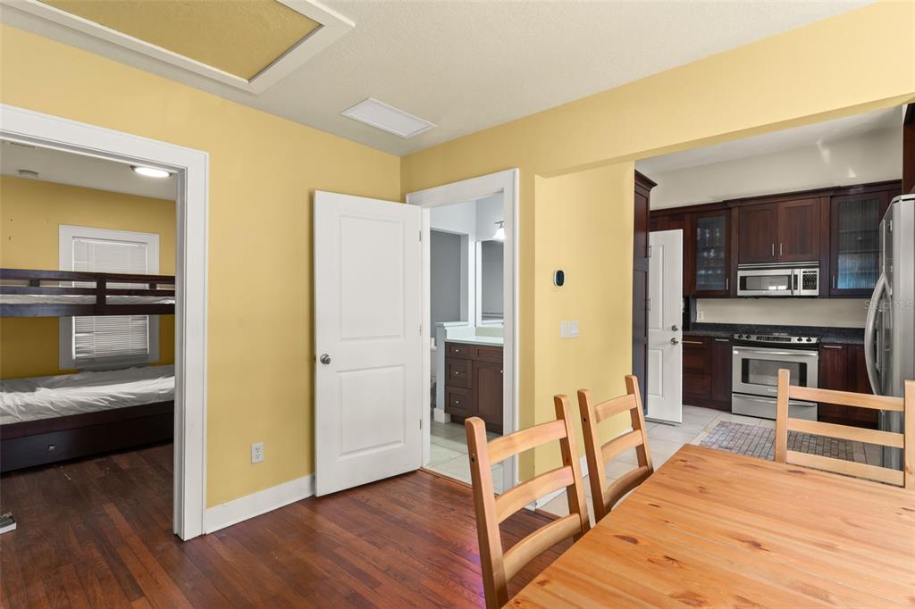 2223 Amherst Avenue Orlando, FL 32804 - Photo 40 of 64 a living room with stainless steel appliances furniture and a kitchen view