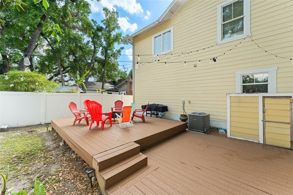 2223 Amherst Avenue Orlando, FL 32804 - Photo 57 of 64 a view of a patio with table and chairs and potted plants