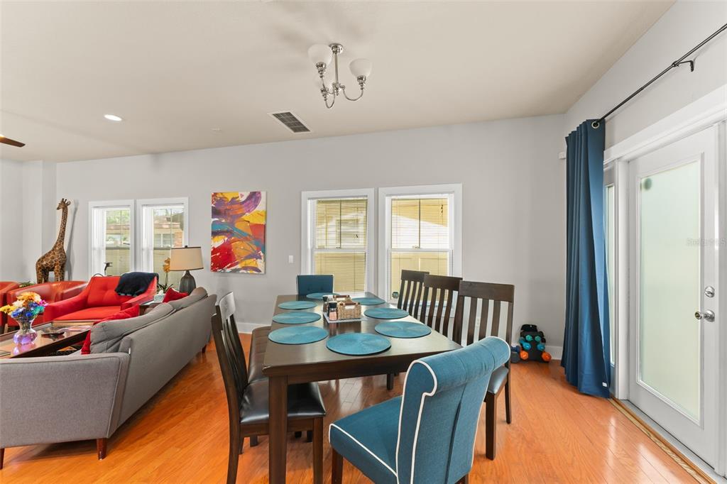 2223 Amherst Avenue Orlando, FL 32804 - Photo 6 of 64 a living room with furniture and a wooden floor