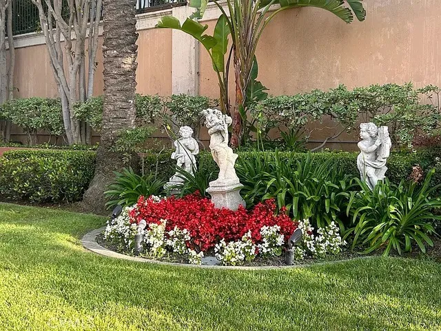a view of a brick house with a large windows and a large tree