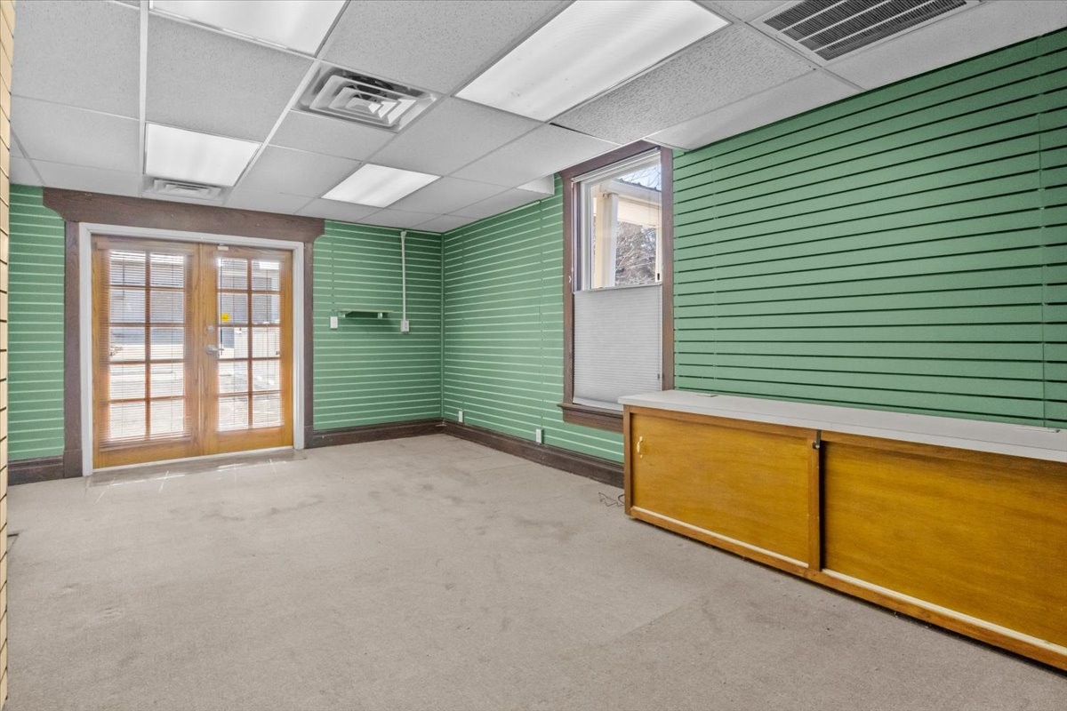 203 East Main Street Waverly, TN 37185 - Photo 6 of 32 a view of an empty room with a window