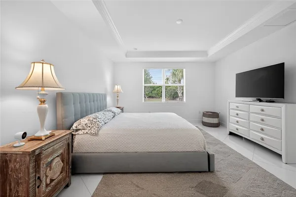 a bathroom with a double vanity sink mirror and shower