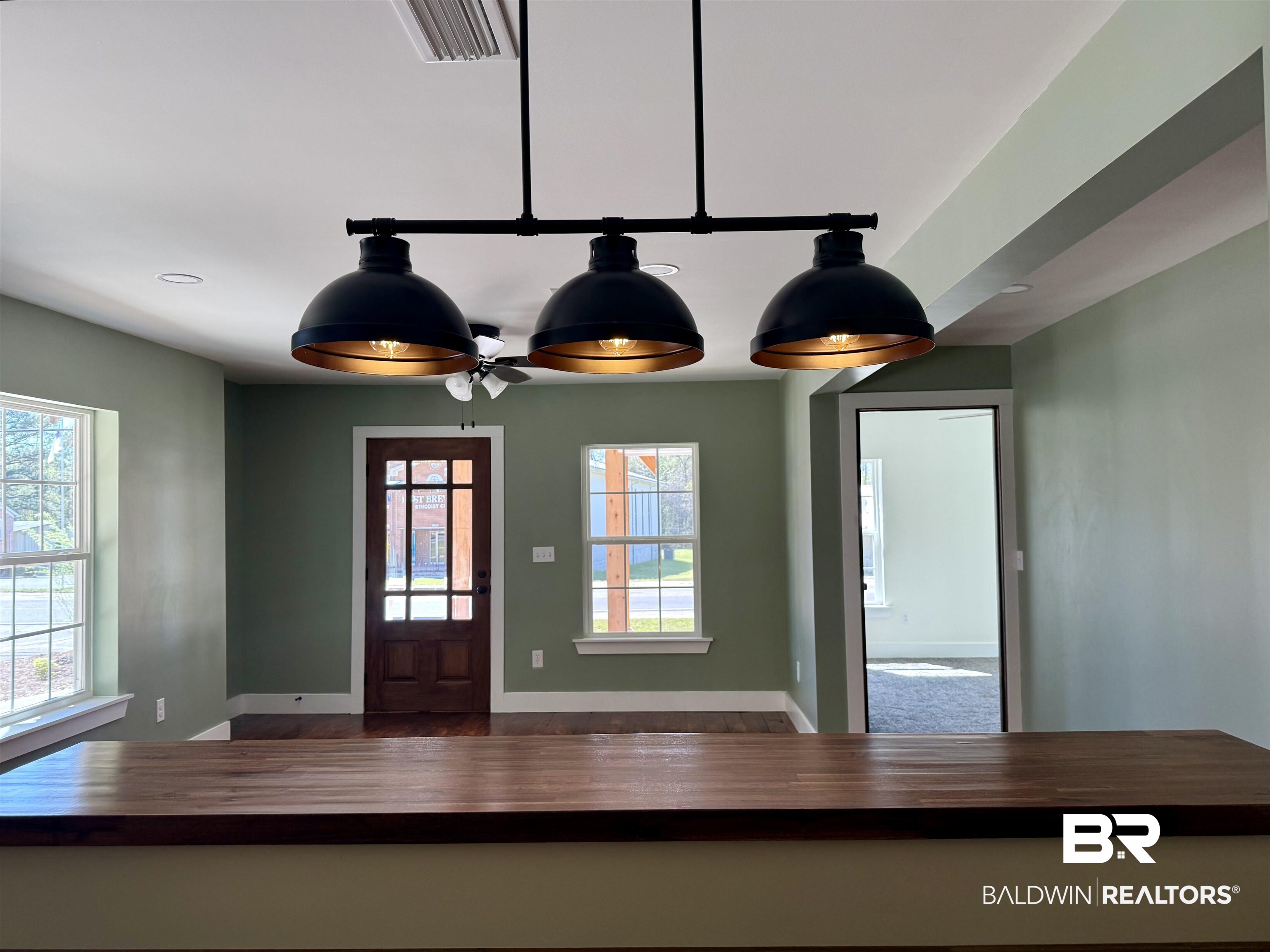 613 Forrest Avenue Brewton, AL 36426 - Photo 9 of 22 Foyer with ceiling fan and baseboards