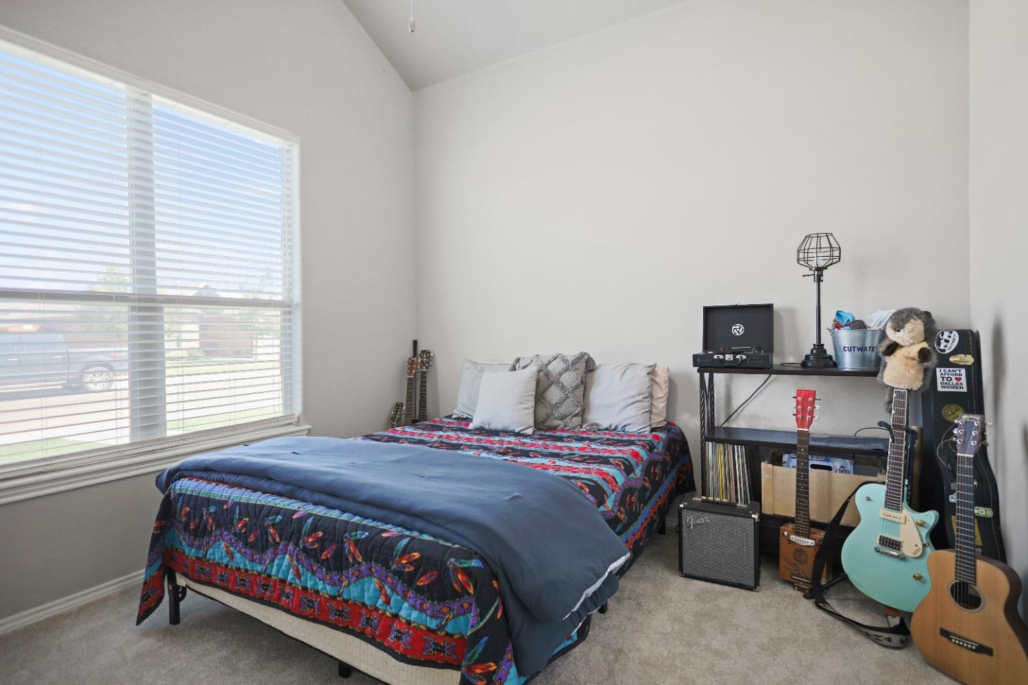 5227 Lehigh Street Lubbock, TX 79416 - Photo 16 of 33 a bedroom with a bed and a window