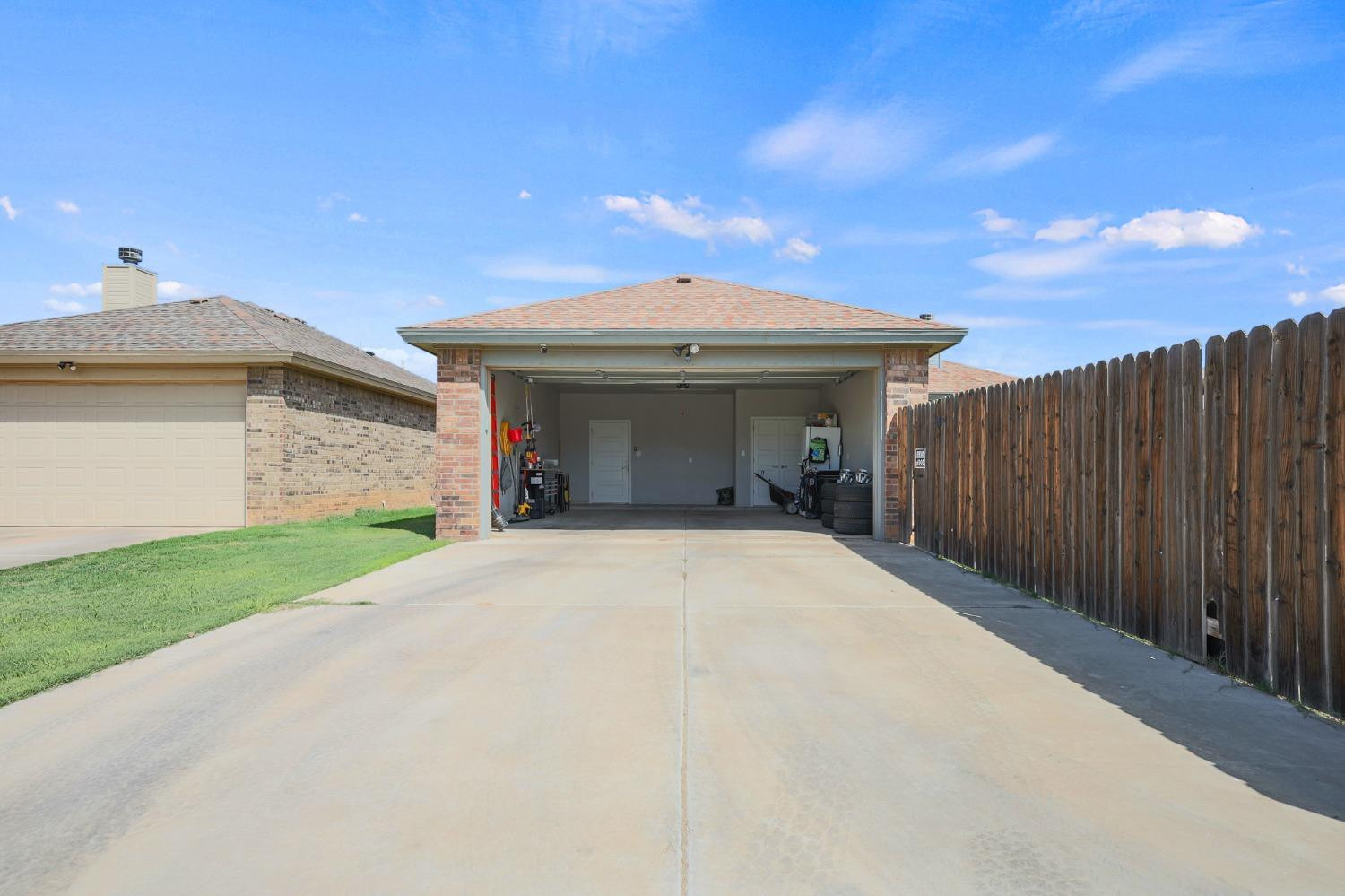 5227 Lehigh Street Lubbock, TX 79416 - Photo 28 of 33 a view of a house with a yard