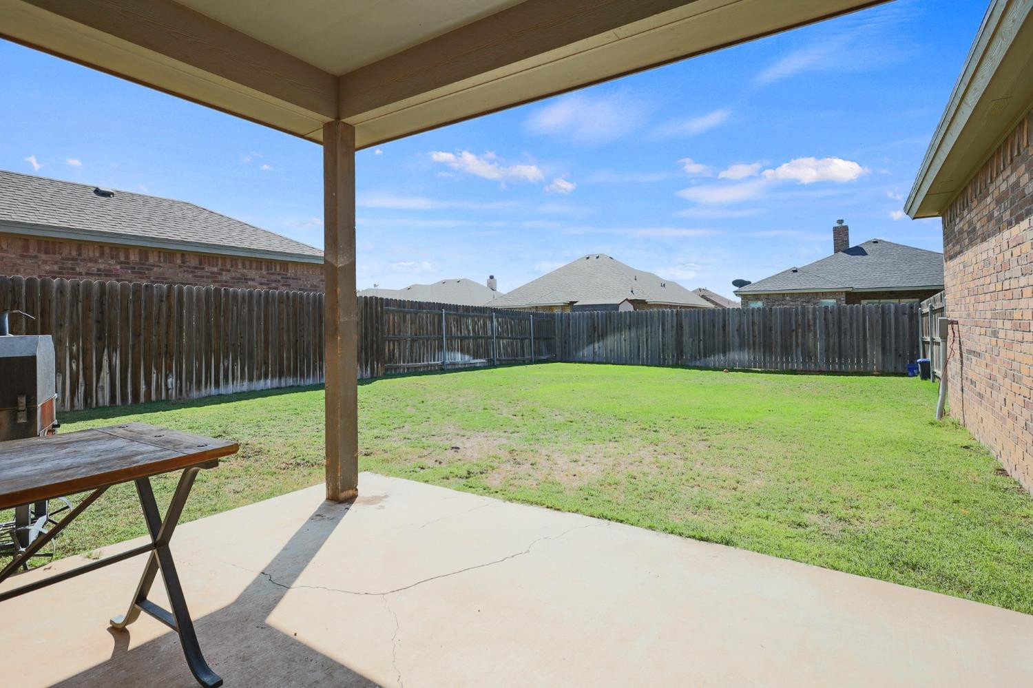 5227 Lehigh Street Lubbock, TX 79416 - Photo 29 of 33 a view of a backyard with a garden
