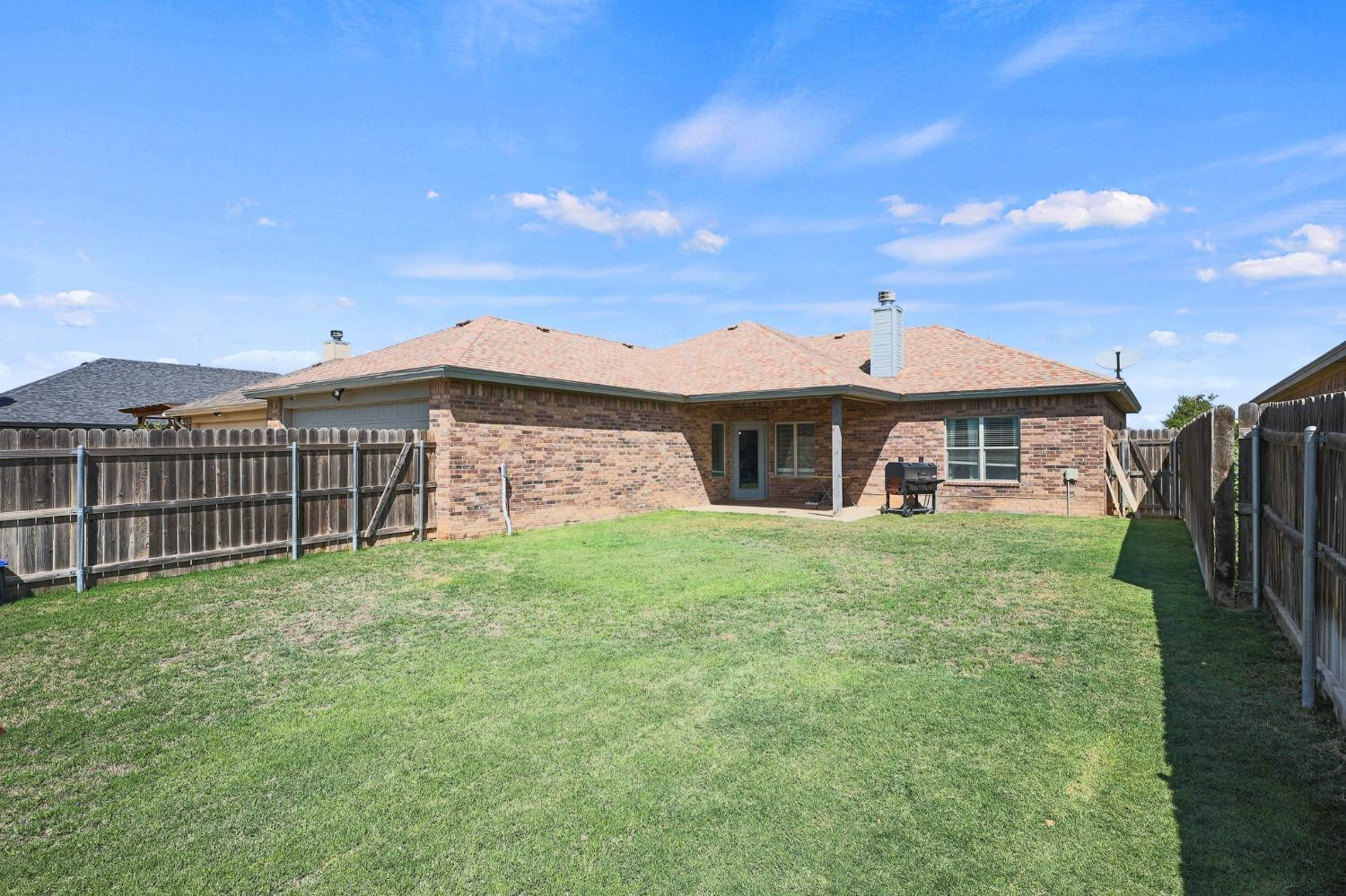 5227 Lehigh Street Lubbock, TX 79416 - Photo 30 of 33 a front view of a house with garden