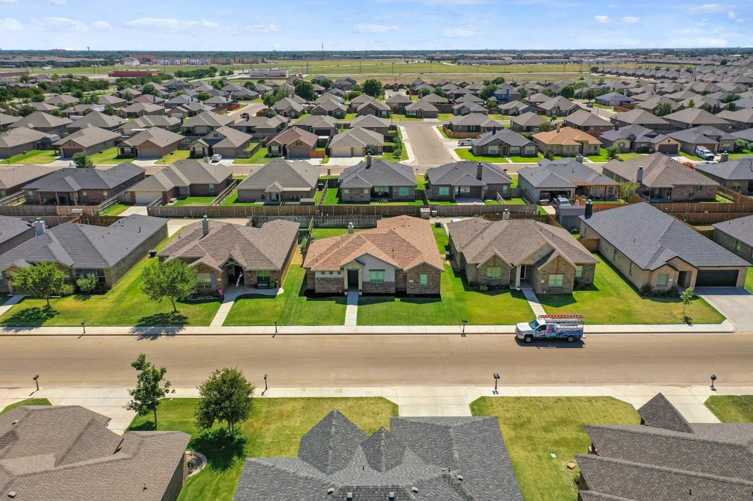 5227 Lehigh Street Lubbock, TX 79416 - Photo 33 of 33 an aerial view of residential houses with street