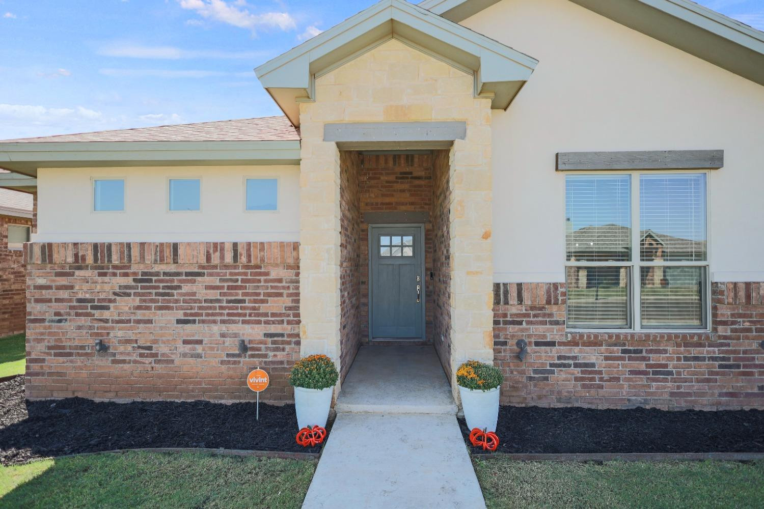 5227 Lehigh Street Lubbock, TX 79416 - Photo 7 of 33 a front view of a house with outdoor