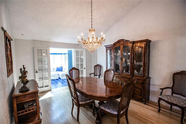 19 Rutgers Road Andover, MA 01810 - Photo 6 of 26 a view of a dining room with furniture and wooden floor