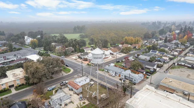 an aerial view of a city with lots of residential buildings