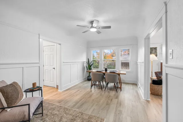 a view of a livingroom with furniture and a window