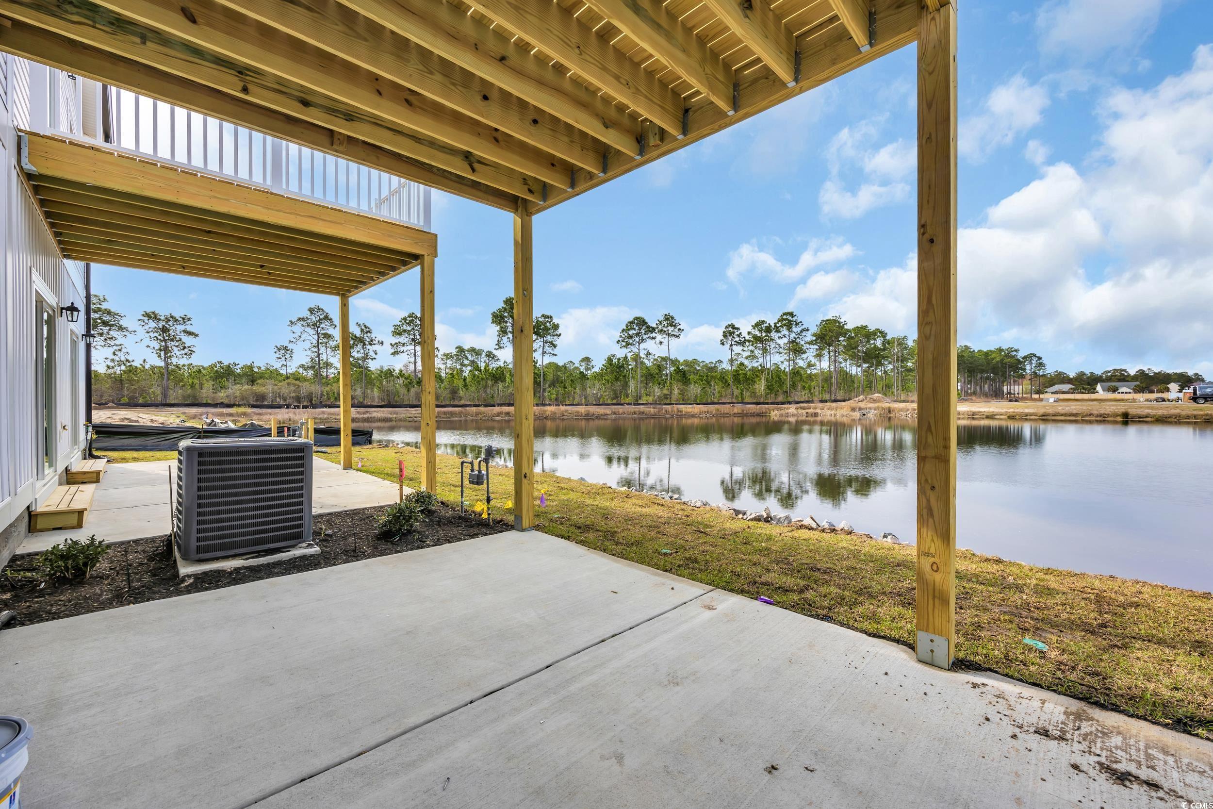 315 Lineback Place, Unit 37 Longs, SC 29568 - Photo 30 of 39 View of patio / terrace featuring a water view and central AC
