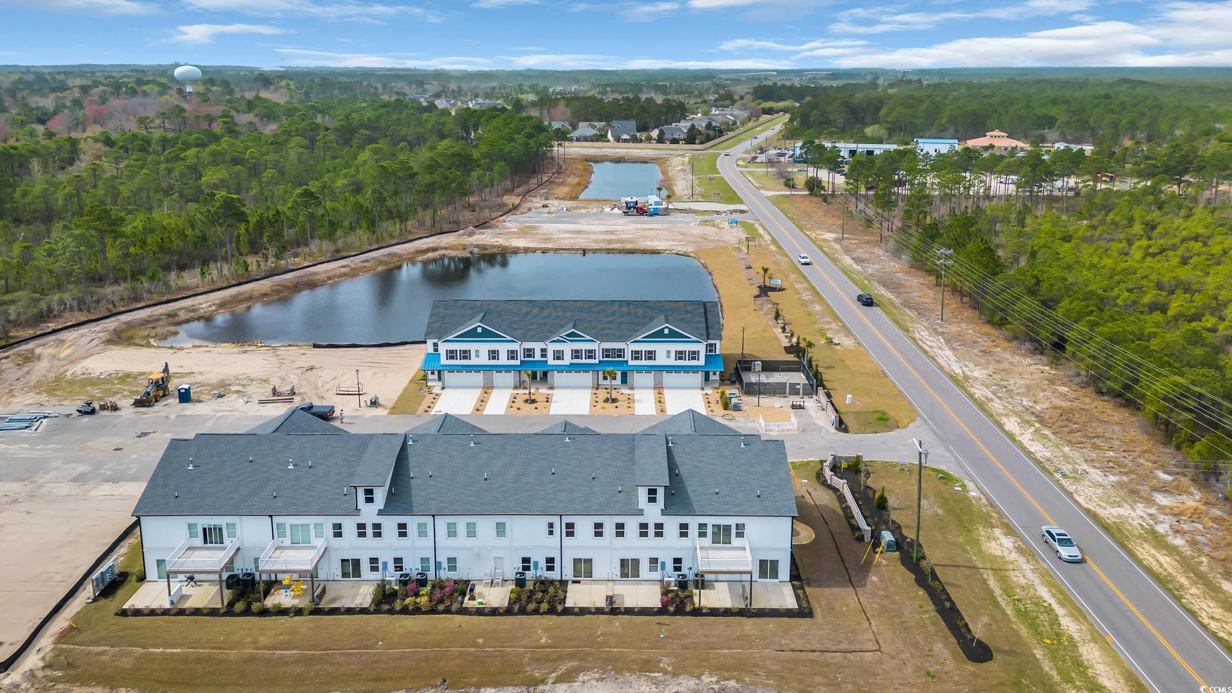 315 Lineback Place, Unit 37 Longs, SC 29568 - Photo 36 of 39 Aerial view with a wooded view and a water view