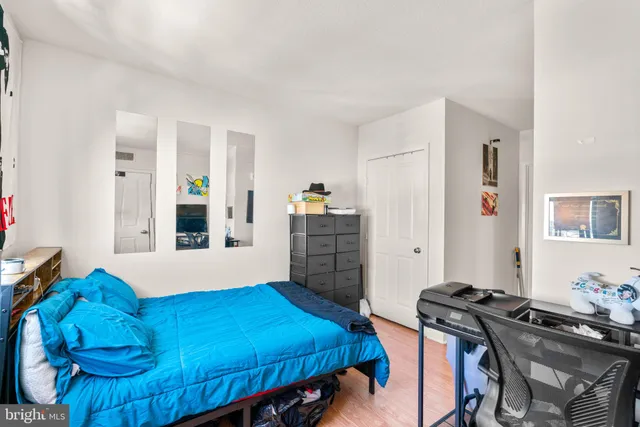 a bedroom with a bed and a bed