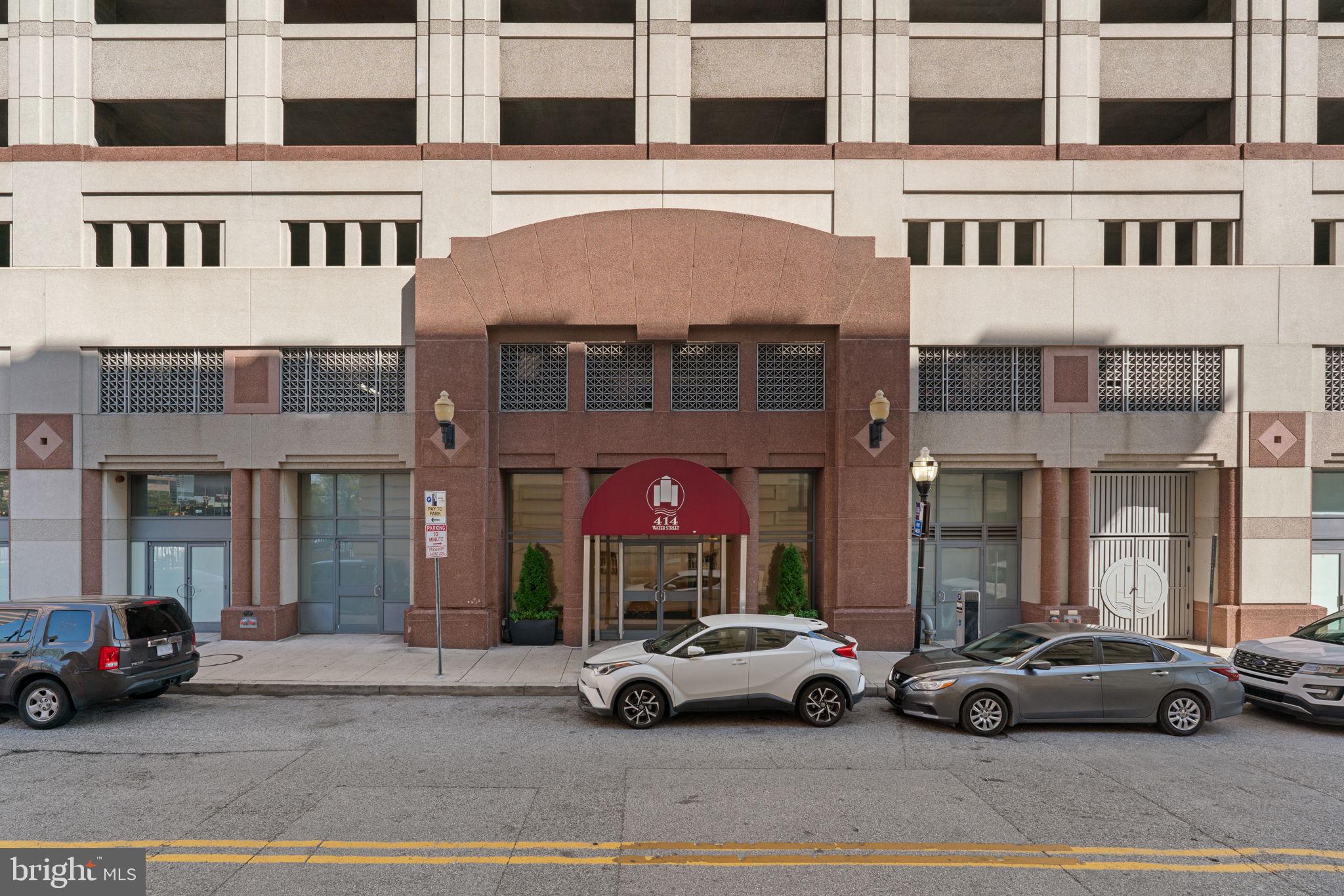414 Water Street, Unit 2311 Baltimore, MD 21202 - Photo 4 of 44 a car parked in front of a building
