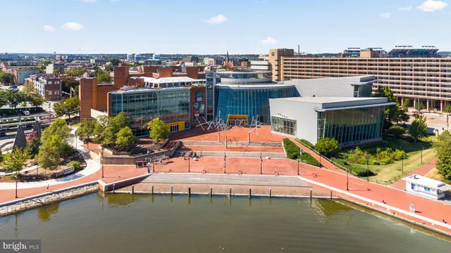 an aerial view of a house with a ocean view