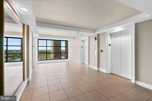 a view of an empty room and window