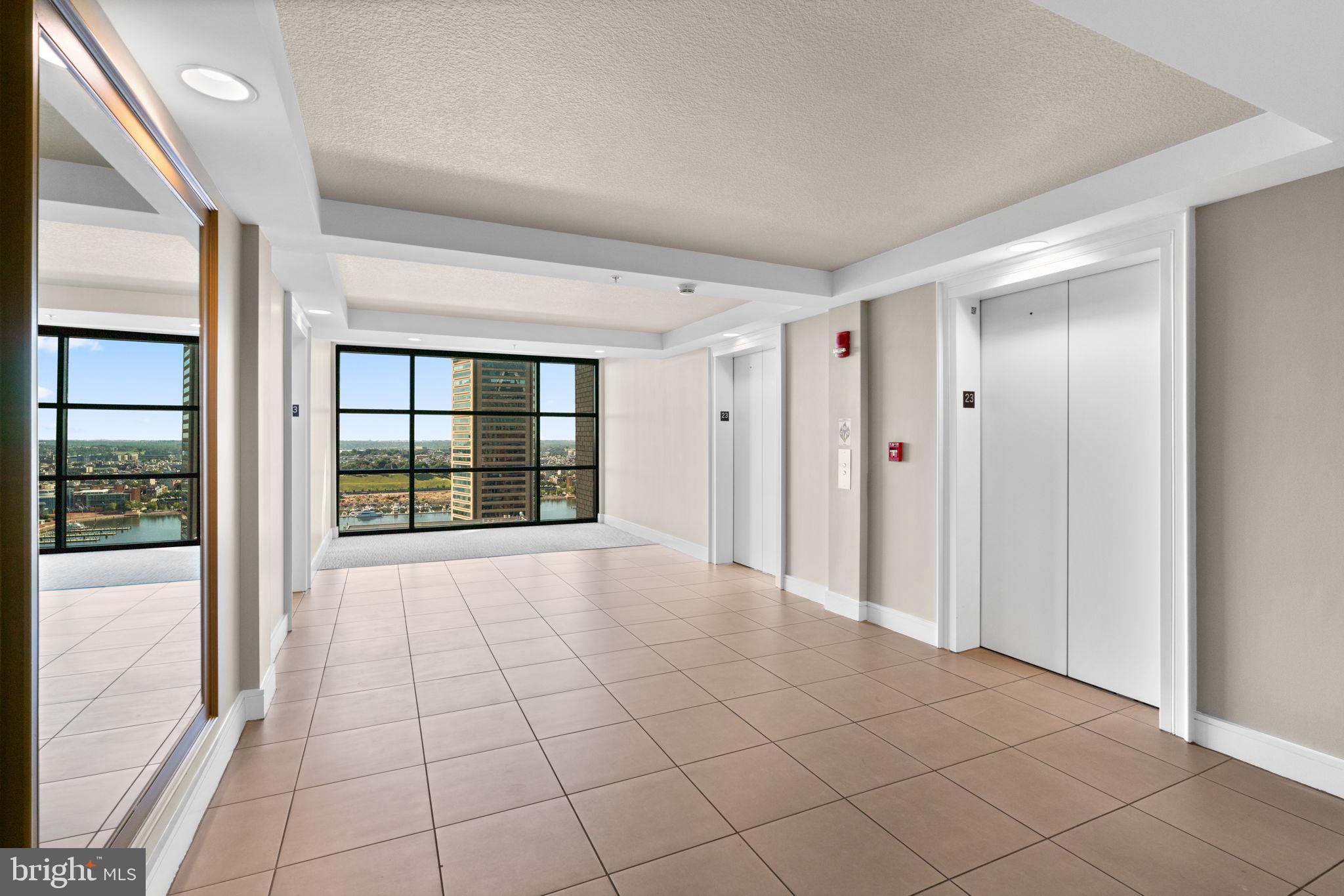 414 Water Street, Unit 2311 Baltimore, MD 21202 - Photo 9 of 44 a view of an empty room and window