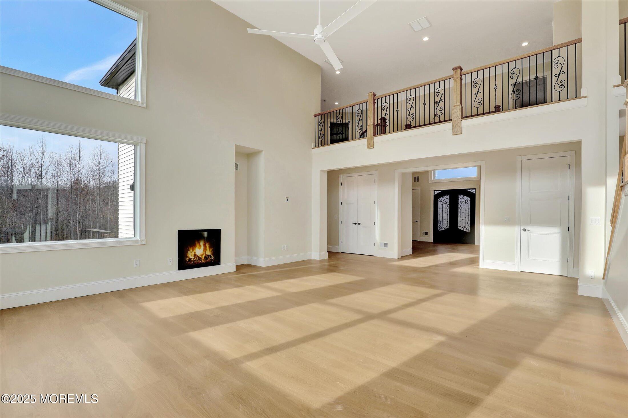5 Cook Court Millstone Township, NJ 08535 - Photo 13 of 58 a view of an empty room with window and fireplace