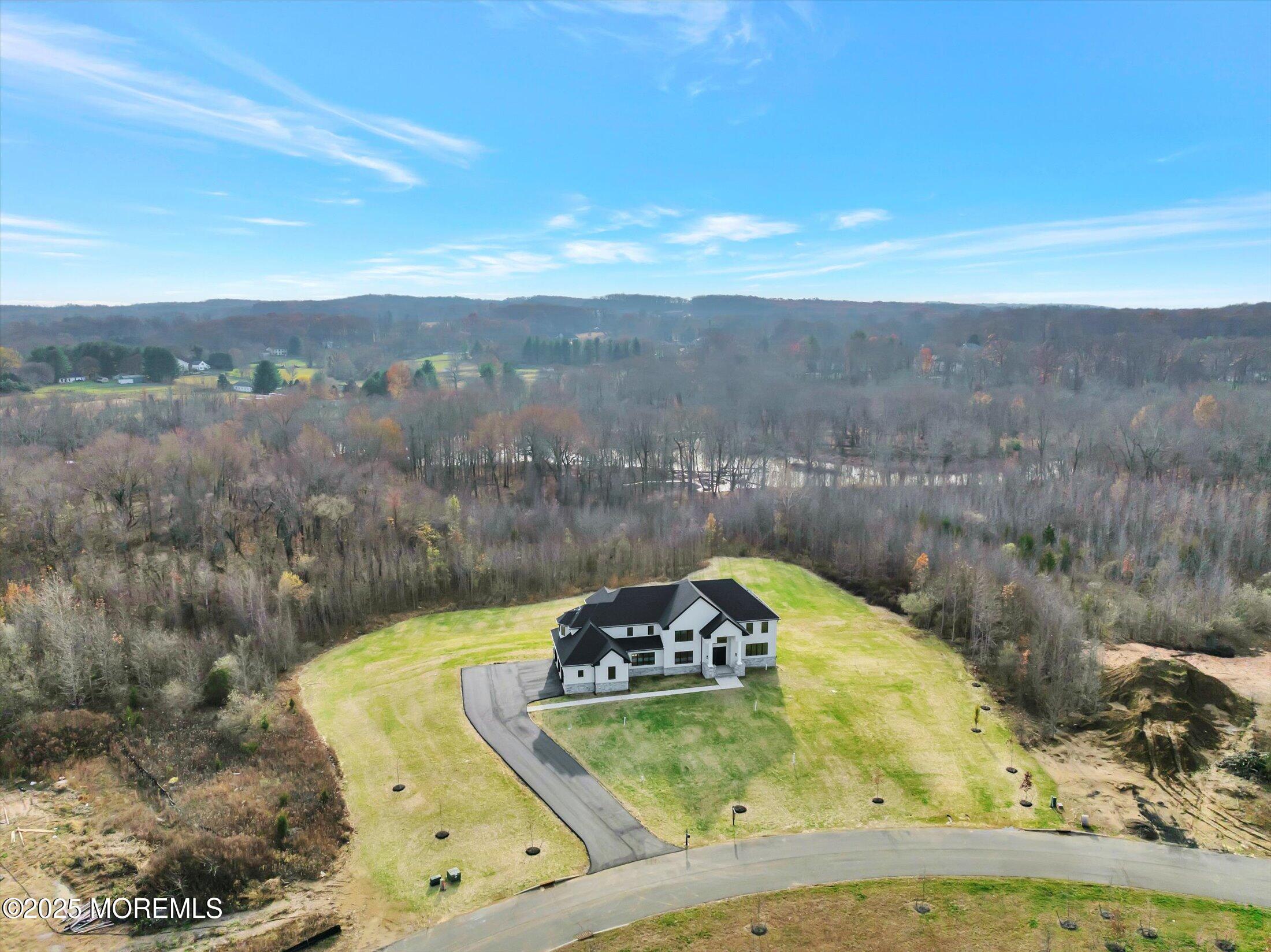 5 Cook Court Millstone Township, NJ 08535 - Photo 35 of 58 a view of a swimming pool with a mountain view