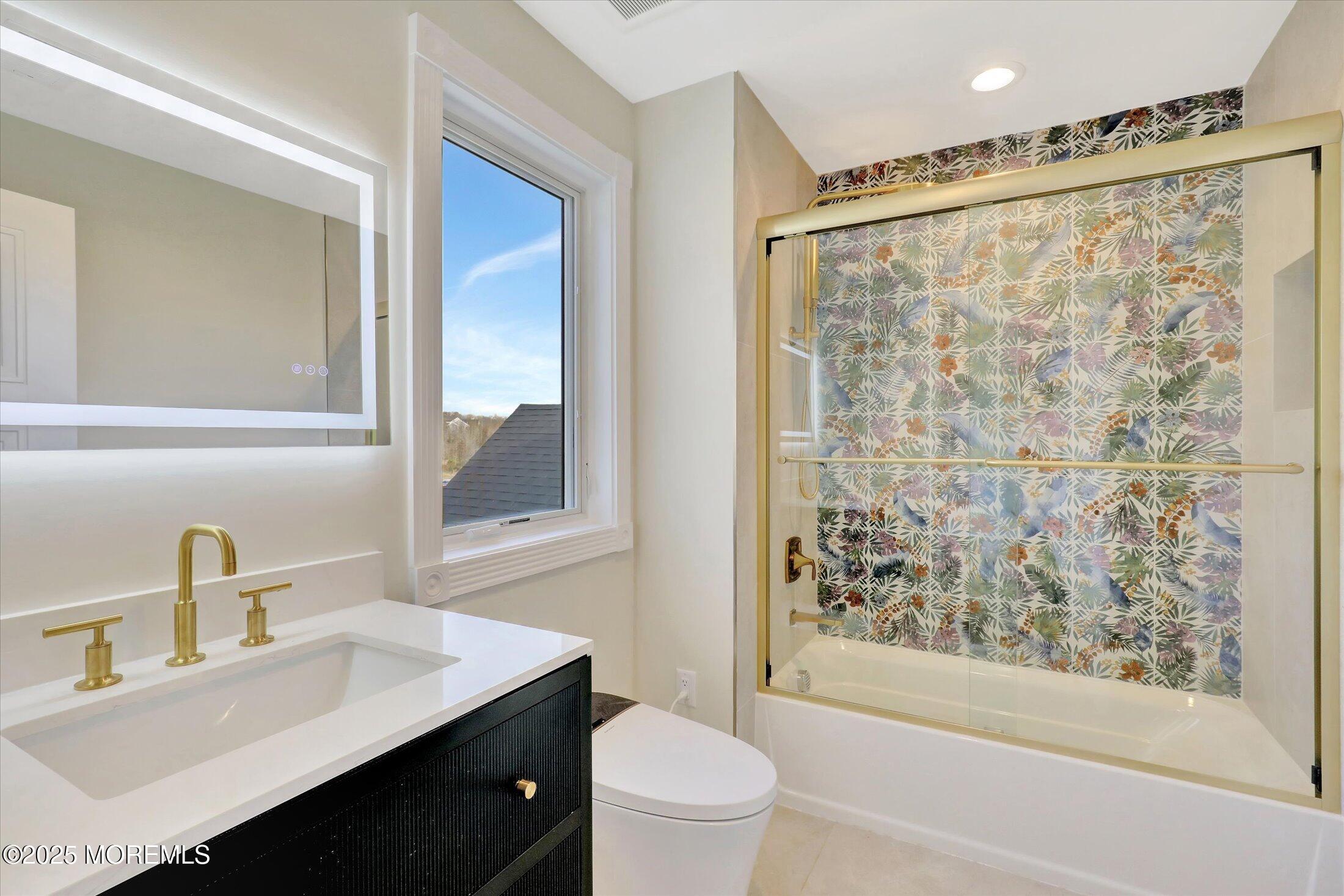 5 Cook Court Millstone Township, NJ 08535 - Photo 39 of 58 a bathroom with a sink and a mirror
