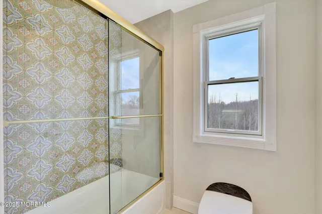 a view of a swimming pool with an ocean view