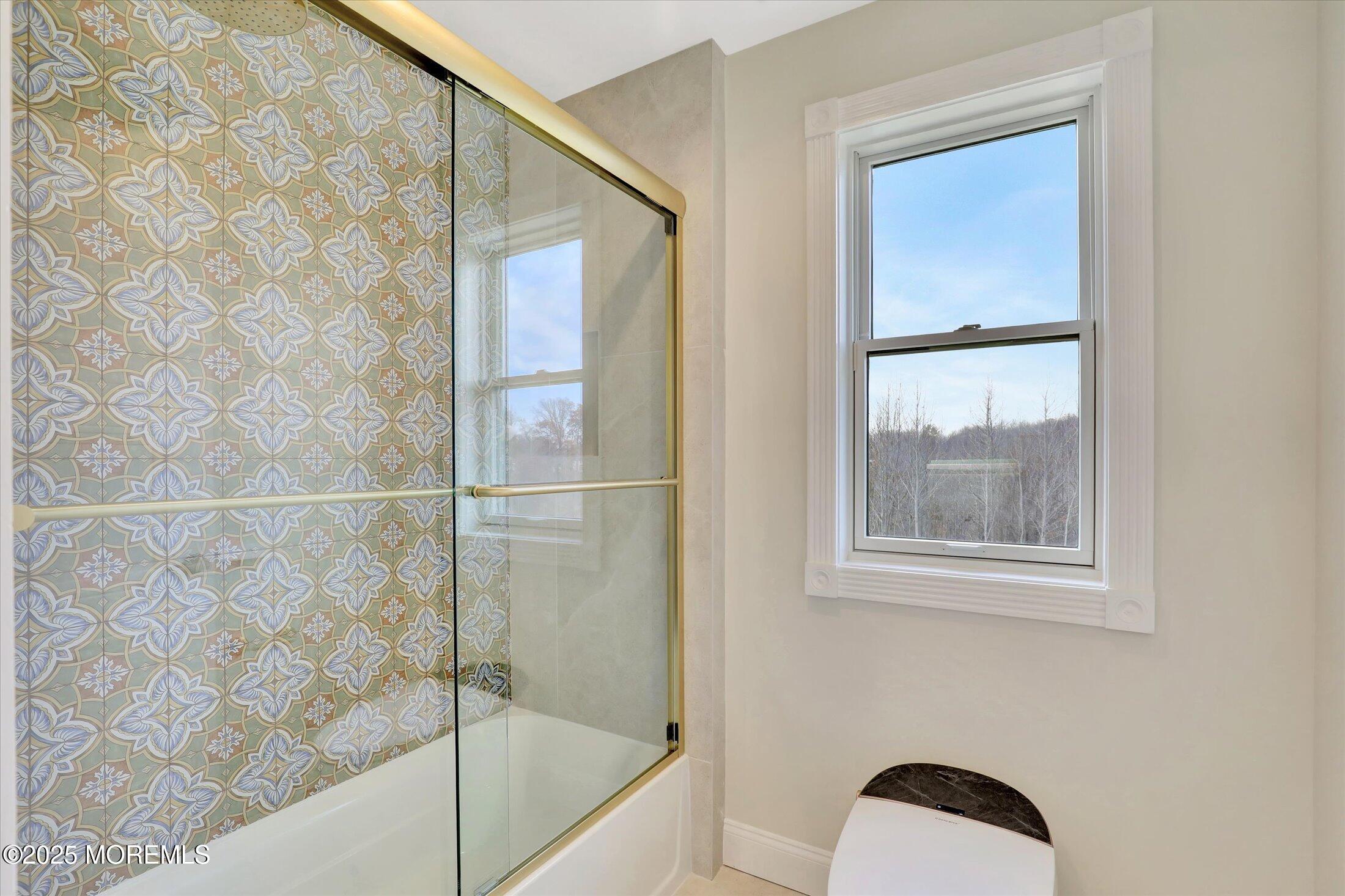 5 Cook Court Millstone Township, NJ 08535 - Photo 42 of 58 a bathroom with a bathtub