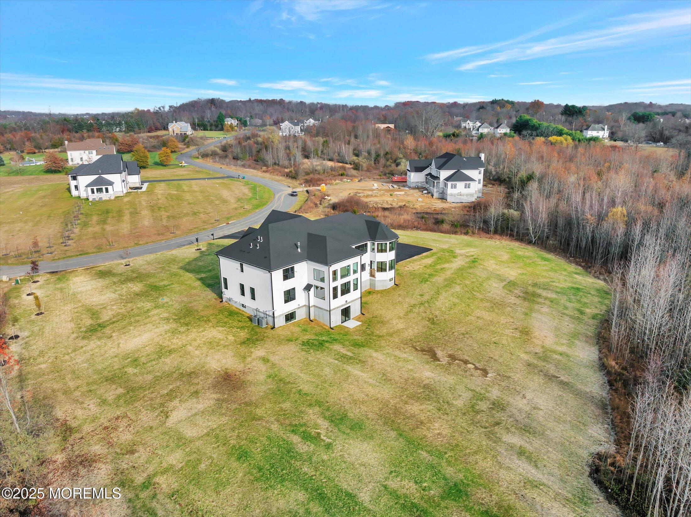 5 Cook Court Millstone Township, NJ 08535 - Photo 49 of 58 a view of a swimming pool with an ocean view