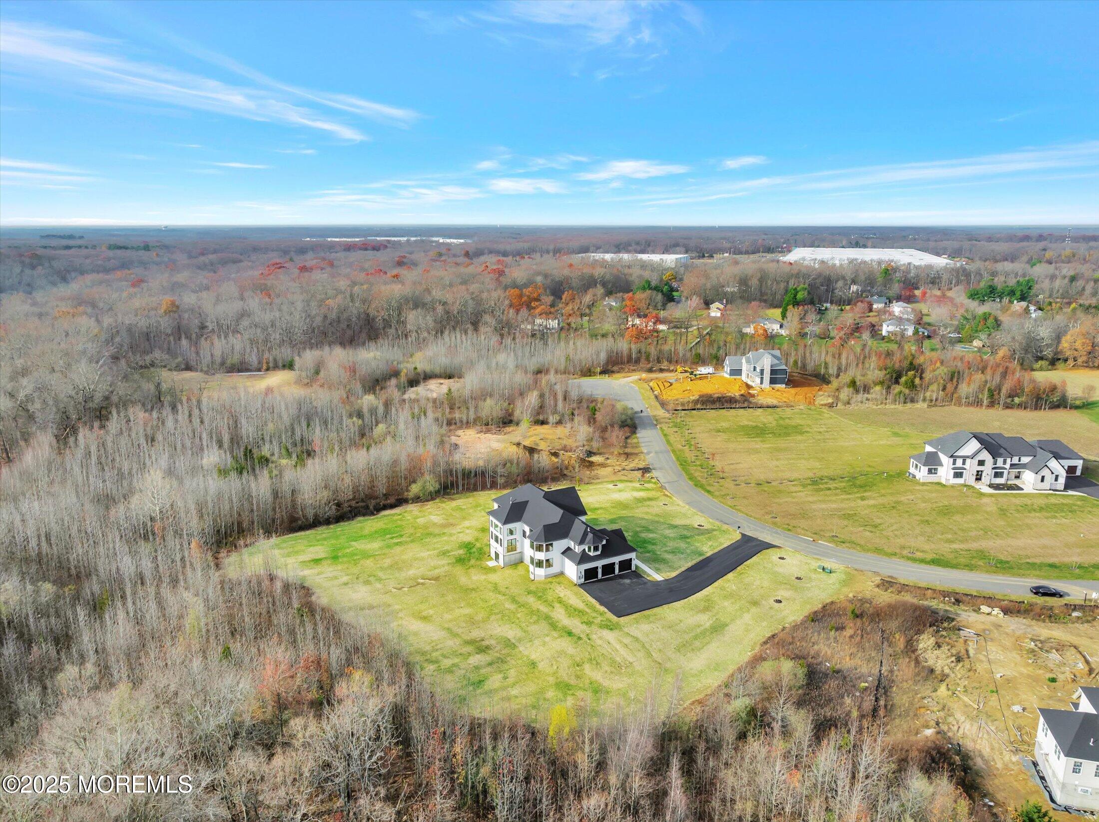 5 Cook Court Millstone Township, NJ 08535 - Photo 50 of 58 a view of a swimming pool with an ocean view