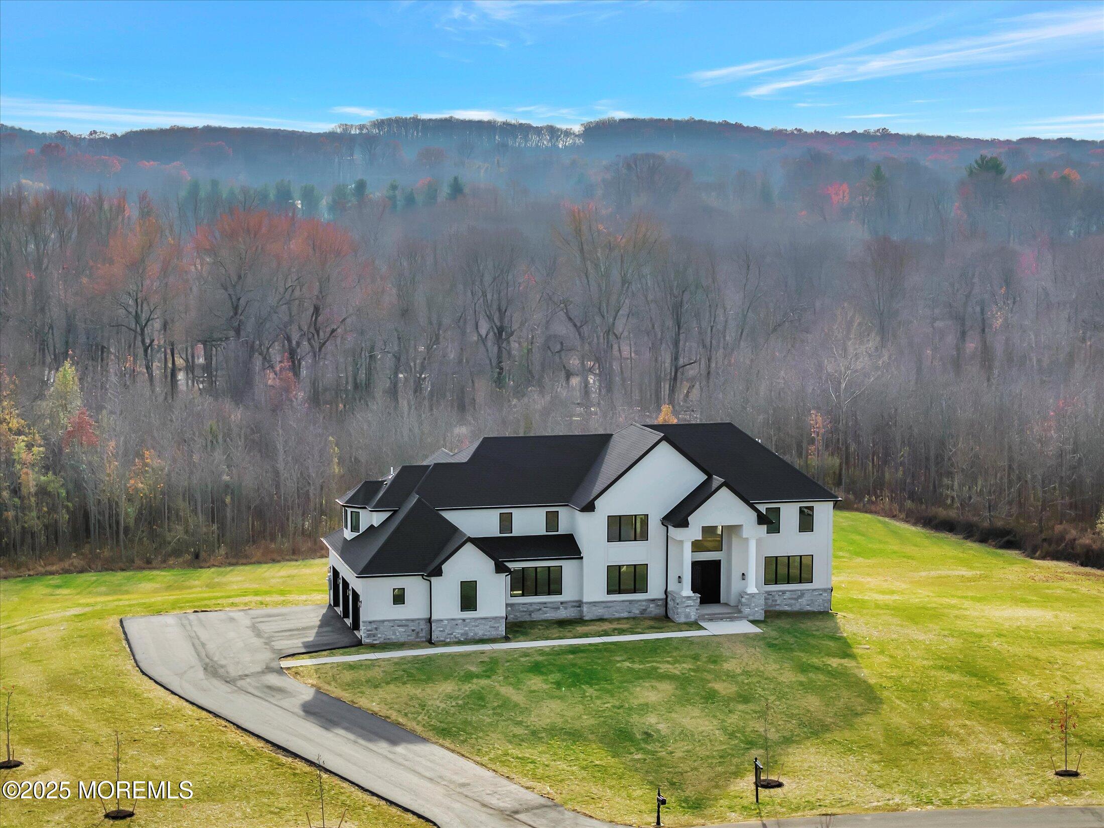 5 Cook Court Millstone Township, NJ 08535 - Photo 6 of 58 a front view of a house with a yard