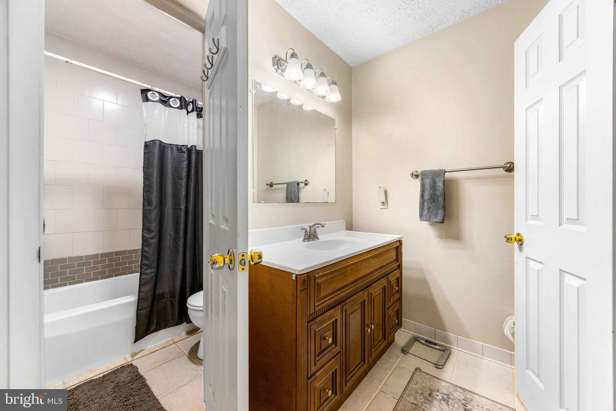 2805 Beckon Drive Edgewood, MD 21040 - Photo 17 of 35 a bathroom with a sink a toilet and shower