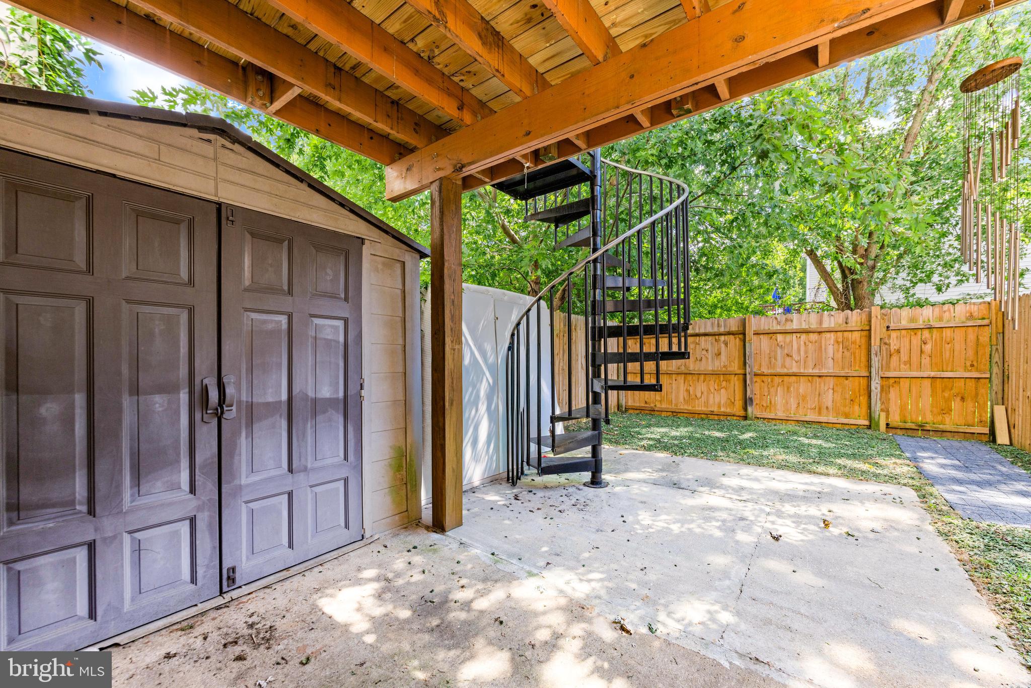 2805 Beckon Drive Edgewood, MD 21040 - Photo 32 of 35 a view of a backyard with wooden fence and large trees